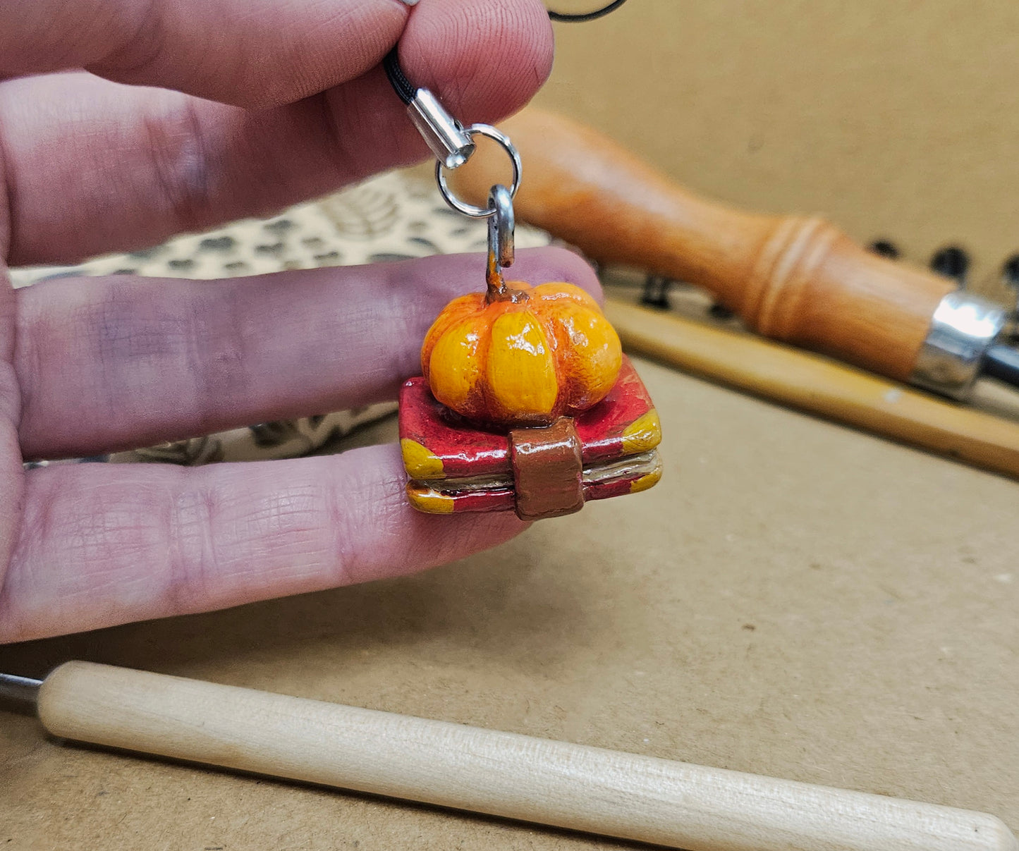 **Hand Sculpted Polymer Clay Pumpkin & Book Charm - Autumn Literary Magic**