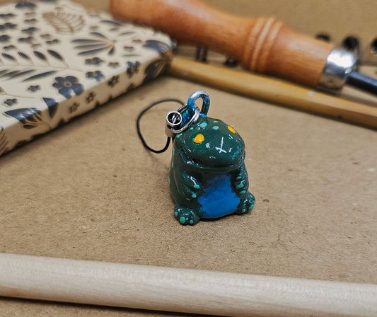 **Tiny Hand Sculpted Polymer Clay Dinosaur Charm - Prehistoric Pal Ready for Adventure**