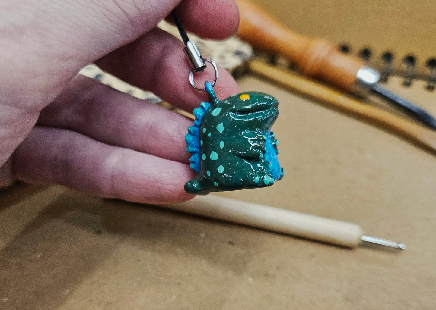 **Tiny Hand Sculpted Polymer Clay Dinosaur Charm - Prehistoric Pal Ready for Adventure**